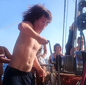 A boy with DS assisting the crew on a sailing boat