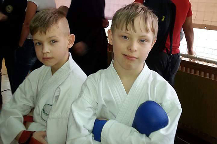 Denis and friend Matvey with boxing gloves