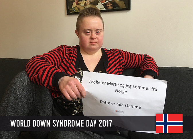 Young Norwegian woman with DS with a sign in her hands, showing her statement for WDSD 2017