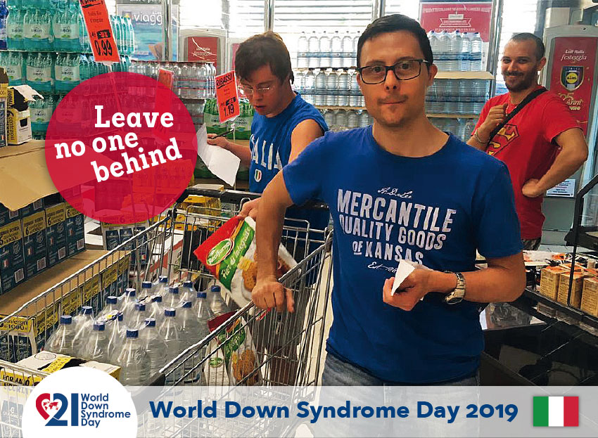 Three young men, one of whom has Down‘s Syndrome, shopping in a supermarket.