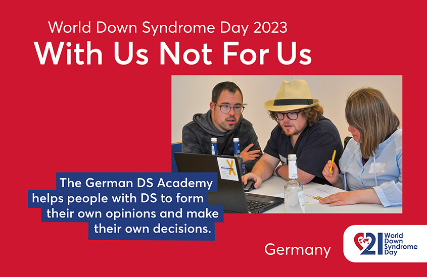Poster of the 2023 EDSA WDSD Poster campaign “With Us Not For Us”. The photo shows a women and two men with DS sitting at a table in front of a laptop, discussing and taking notes. Text to the photo shown: The German DS Academy helps people with DS to form their own opinions and make their own decisions.