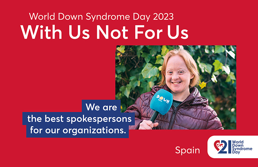 Poster of the 2023 EDSA WDSD Poster campaign “With Us Not For Us”. The photo shows a youg women with Down syndrome standing in the open holding a microphone. Text to the photo shown: We are the best spokespersons for our organizations.